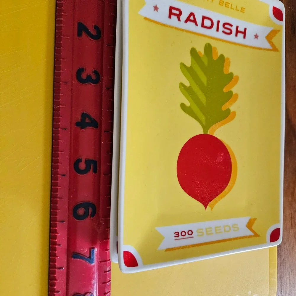 appetizer plates made to look like a seed packet two onion&radish crate&barrel